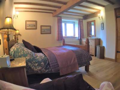 The Granary Master Bedroom seating view