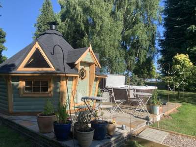 Spa in use and BBQ Hut